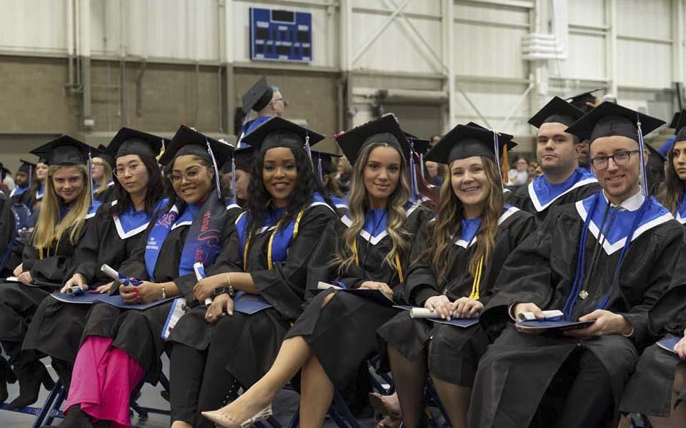 Graduates eagerly await the 107th commencement ceremony